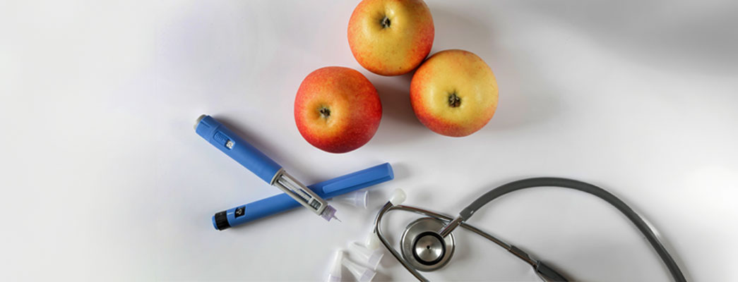 Diabetesspritzen, Äpfel und Stethoskop