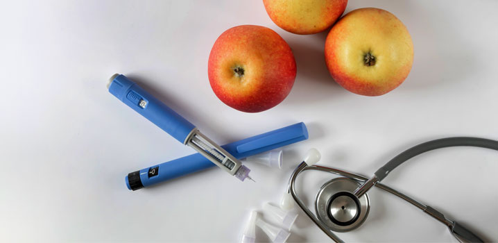 Diabetesspritzen, Äpfel und Stethoskop